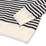 Striped fabric with a visible brand label on a white background