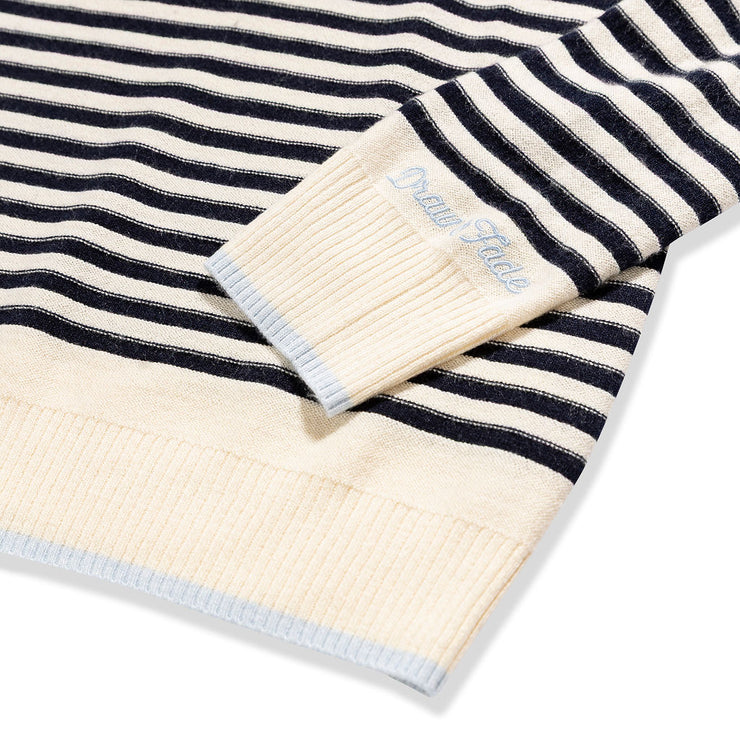Striped fabric with a visible brand label on a white background