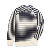 Blue and white striped sweater with cream cuffs and hem on a white background
